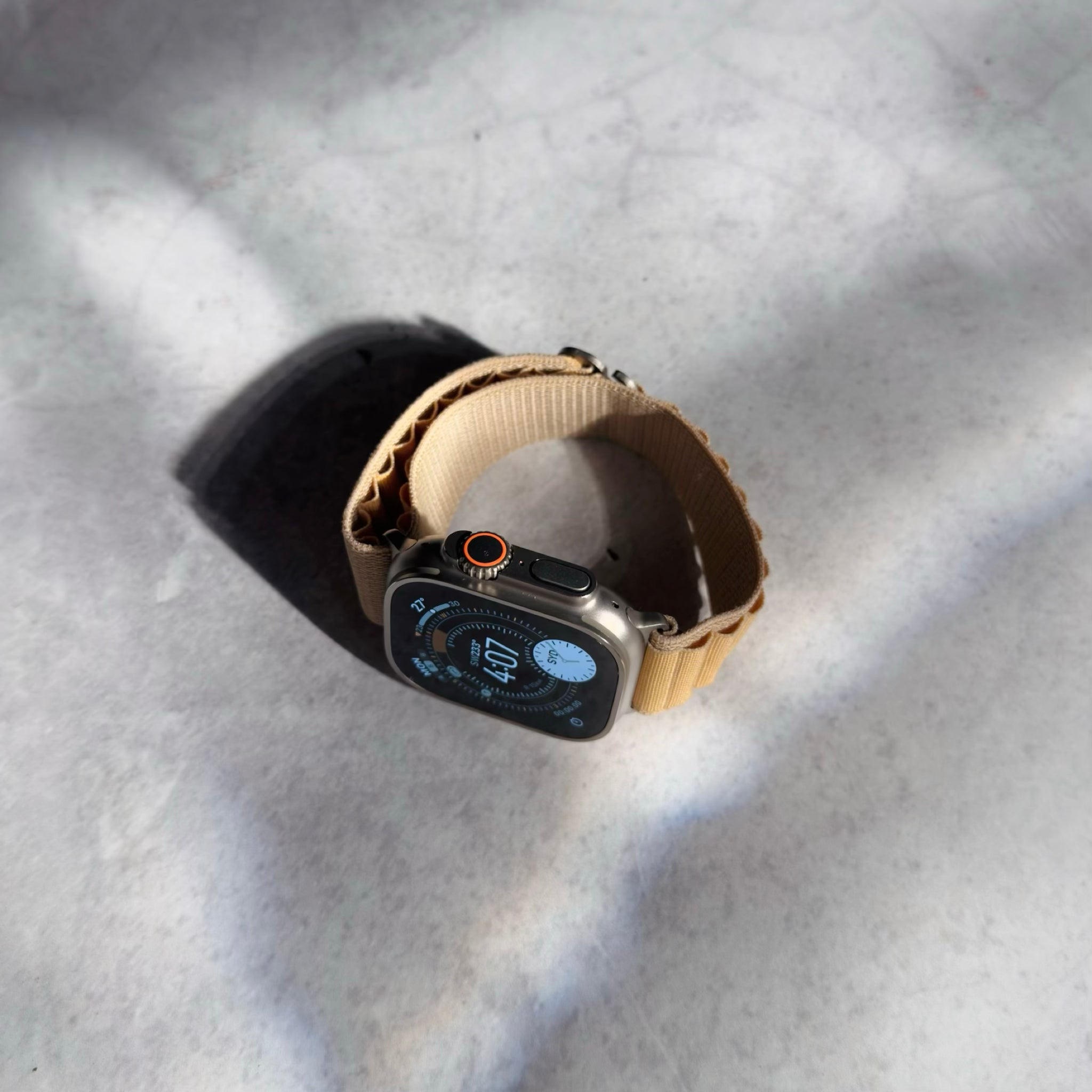 Apple Watch Ultra with tan Alpine Loop